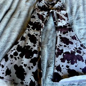 Rock and roll denim cow print flares